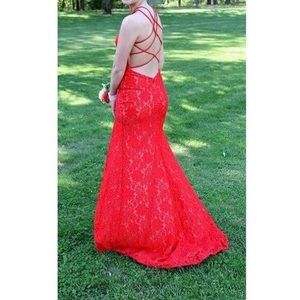 Red laced la femme prom dress